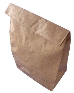 a brown paper bag on a white background