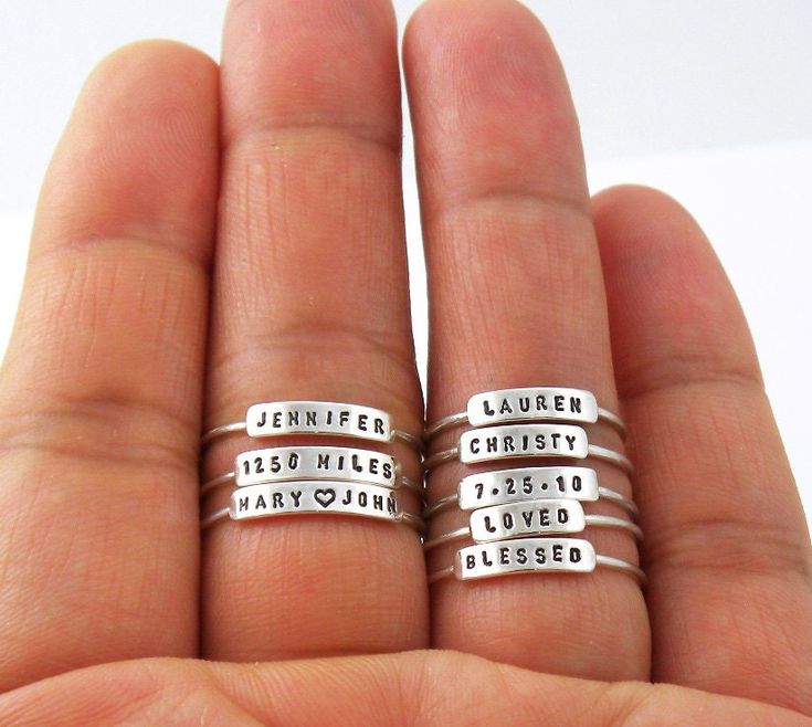 "The listing is for 1 ring. This dainty, personalized ring is a perfect gift for wife, mom, and grandma. The letters are hand stamped with any name, date, inspiration, and motivation word. The letters are tiny, yet very readable, on this petite and dainty ring. Each ring is small enough that many rings can be stacked on a single finger. [ Material ] The band is Argentium silver and the nameplate is sterling silver. Argentium silver is a high quality sterling silver with tarnish-resistant attribu Date Inspiration, Personalized Stackable Rings, Birthday Mother, Family Rings, Name Rings, Personalized Rings, Stackable Ring, Stamped Jewelry, Unique Engagement