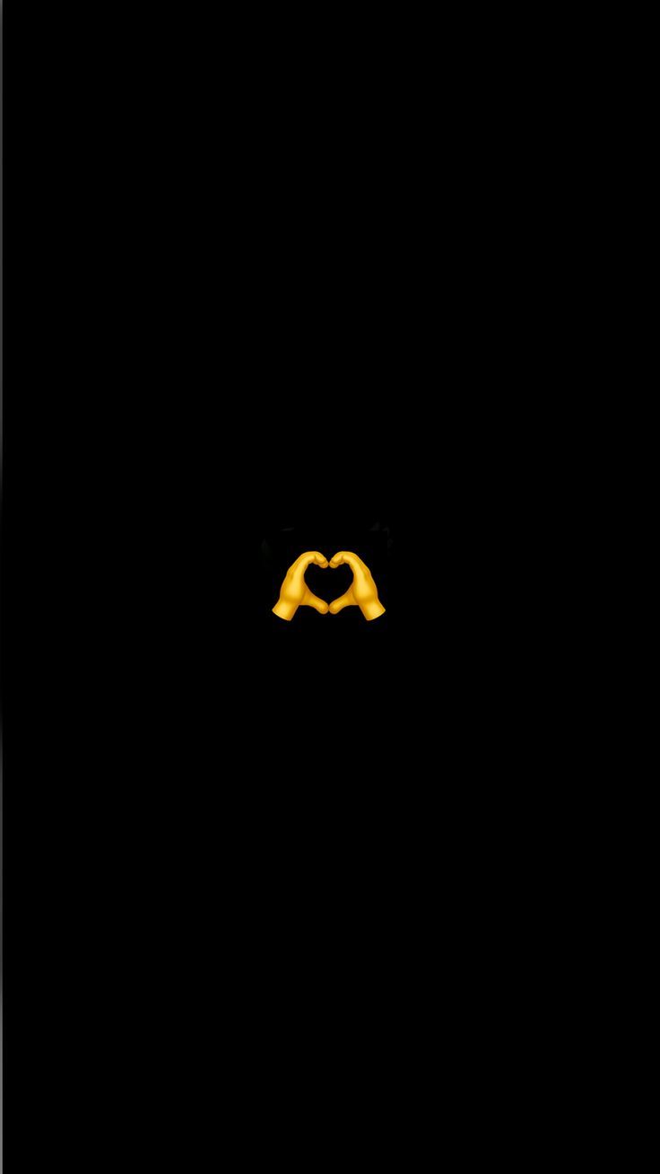 a black background with a yellow heart in the middle