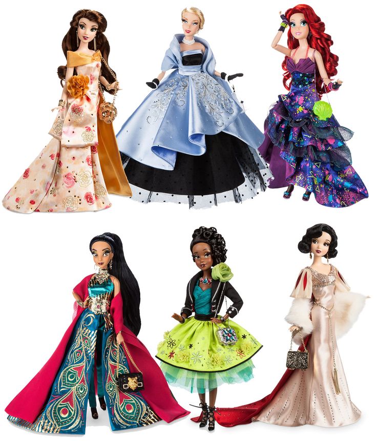 barbie dolls are lined up in different dresses