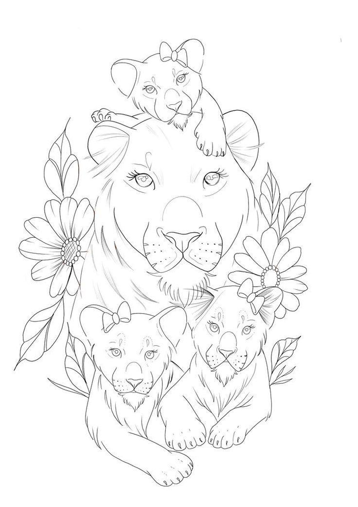 an adult lion with two cubs and flowers