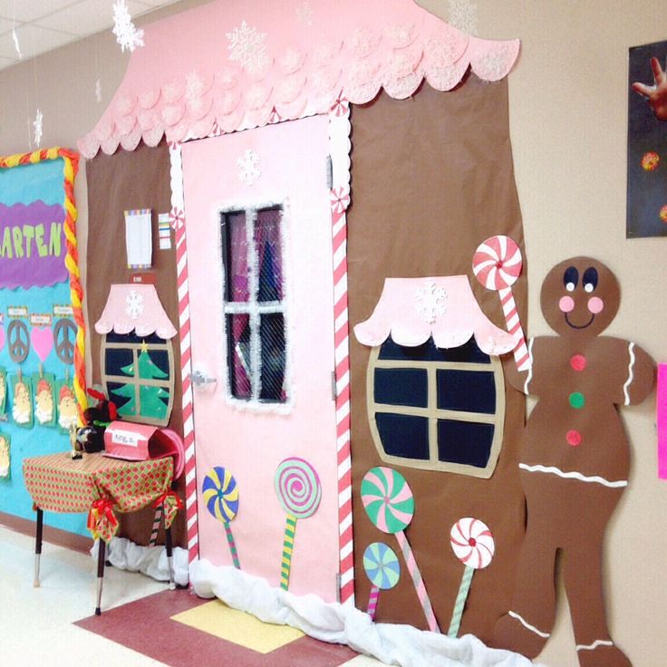 a classroom decorated for christmas with gingerbreads and candy canes on the door