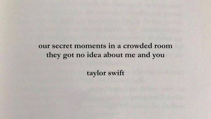 an open book with the words taylor swift written in black and white on top of it