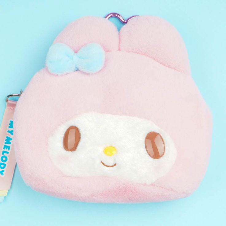 Keep your powder compact, folding comb, and other small beauty essentials inside this kawaii My Melody face pouch! This soft and fluffy case also comes with a unique transparent window at the back — so you don’t need to open it often to check on your stuff. Made from super soft material Comes with a zipper closure and a heart-shaped metal carabiner Created in celebration of the 2024 Sanrio Character Awards Compact Portable Pink Pouch, Cute Pink Compact Bag, Cute Compact Pink Bag, Pink Kawaii Cosmetic Bag Gift, Kawaii Pink Rectangular Pouch, Pink Rectangular Kawaii Coin Purse, Pink Compact Pouch, Compact Pink Cosmetic Bag, Compact Pink Pouch For Personal Use