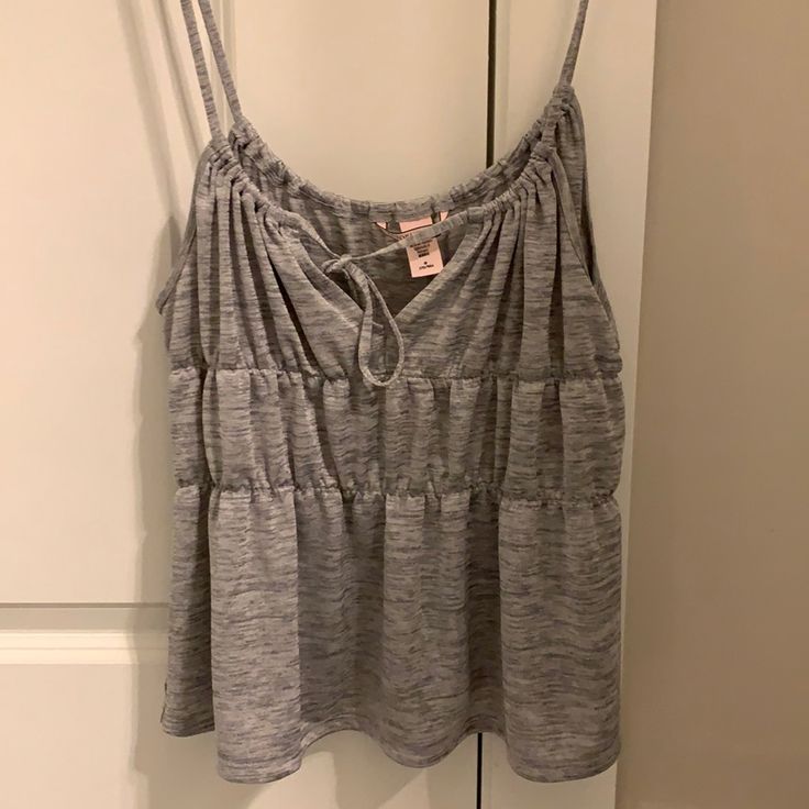 Very Cute And Stretchy Summer Tank Top, But Too Short For Me. I Think It Runs A Little Small For A Medium. The Front Can Be Untied And Adjusted For The Right Strap Size. Never Worn! Smoke Free And Cat Free Home! Victoria's Secret Tops For Summer Loungewear, Victoria's Secret Summer Loungewear Top, Victoria's Secret Tops For Spring Vacation, Victoria's Secret Spring Vacation Tops, Victoria's Secret Casual V-neck Tops, Victoria's Secret Summer Vacation Top, Victoria's Secret Summer Top, Victoria's Secret Sleeveless Loungewear Top, Summer V-neck Tops By Victoria's Secret