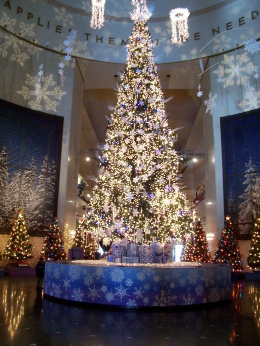 a large christmas tree in the middle of a building