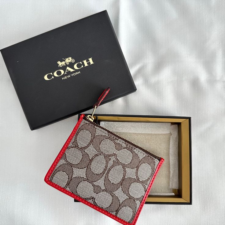 Never Used, Box And Labeled Color: Cocoa And Sport Red Rectangular Coin Purse With Original Box As Gift, Chic Red Wallet With Card Slots, Coach Bifold Coin Purse Gift, Rectangular Coach Coin Purse For Gift, Chic Rectangular Wallets For Gifts, Formal Coach Rectangular Card Holder, Coach Rectangular Wallets As Gift, Classic Coach Wallet As Gift, Chic Rectangular Card Holder For Gift