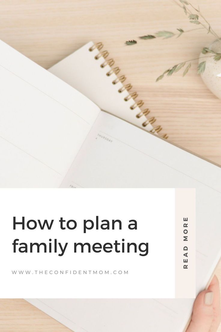 a person's hand holding a notebook with the title how to plan a family meeting