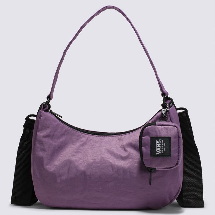 Sleek and chic, the Catch Fire Shoulder Bag is a stylish and structured shoulder bag that demands attention. Its zip closure, interior zip pocket, detachable zip pouch and a removable, adjustable shoulder strap are capped off with a nylon exterior sporting a bold flame design. Shell: 100% Nylon fabric Lining: 100% Recycled Polyester fabric Zip closure Interior zip pocket Detachable zip pouch Removable, adjustable shoulder strap Capacity: 3 liters Dimensions: 11.5''w x 8''h x 3.5''d | Vans Catch Urban Shoulder Bag With Adjustable Strap For On-the-go, Urban Shoulder Bag With Zipper Closure For Everyday Use, Trendy Commuting Bags, Trendy Commuter Shoulder Bag With Removable Pouch, Trendy Vans Travel Bag, Versatile Shoulder Bag With Zipper For Commuting, Vans Rectangular Bag For Daily Use, Vans Rectangular Bag For Everyday, Urban Crossbody Shoulder Bag With Zipper Closure