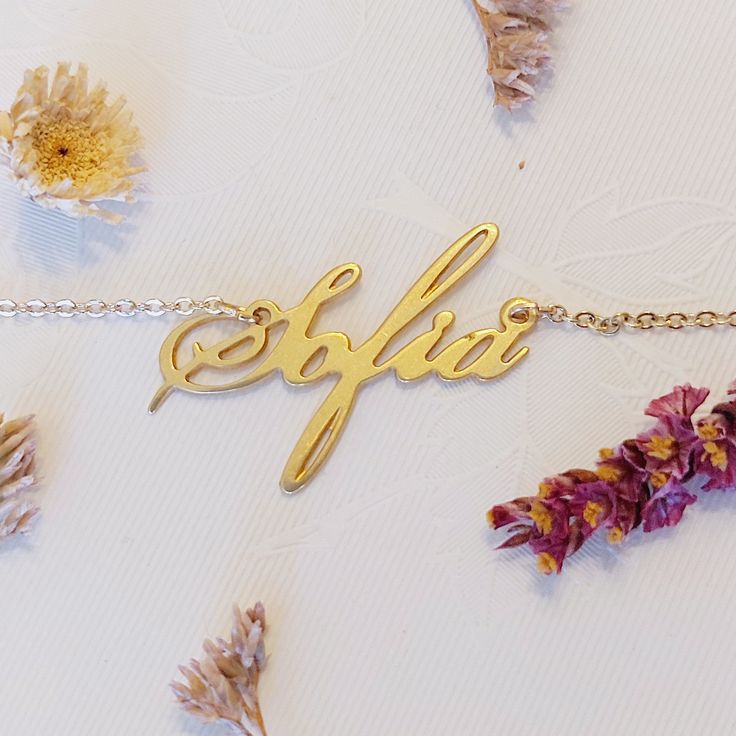 14k Yellow Gold - Name Bracelet - Dainty Gold Bracelet - Personalized Jewelry - Cursive Name - Custom Name Bracelet - Customized Gift -Sofia . . . . . . . . . . . . . . . . . . . . . . . . . . . . . . . . . . . . . . . . . . . . . . . . . . . . . . . . . . .  Looking for a thoughtful gift for your loved one?  You will love this high quality personalized 14k yellow gold cursive name bracelet.  This is a perfect gift for your girlfriend or wife.  Personalize it with her name in a beautiful font. T Gold Name Bracelet, Ankh Necklace, Sunshine Necklace, Dainty Gold Bracelet, Celestial Necklace, Family Necklace, Gold Armband, Gold Name Necklace, Bracelet Dainty