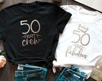 two t - shirts with the words 50 and fabulous printed on them next to other items