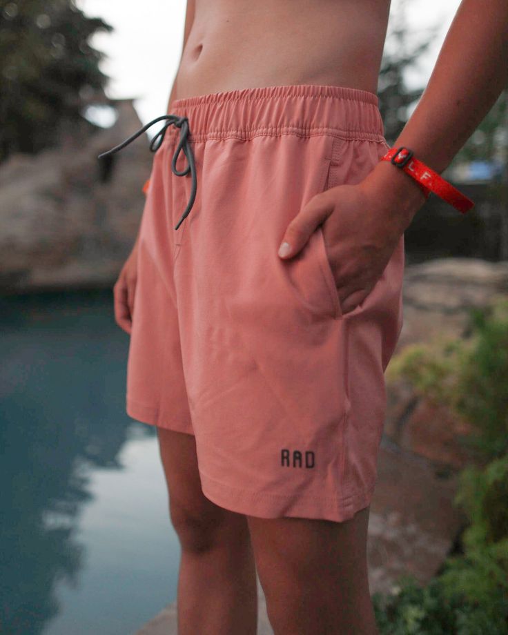 Your favorite swim trunks, now in a new color: Mauve! And, they are seriously so RAD! Here are a few of our favorite features of the Noah: 4-way stretch Drawstring waist band Back pocket with rivet No inner lining Rubber stamp Rad logo True to size Casual Swim Trunks With Built-in Shorts For Warm Weather, Swim Trunks With Built-in Shorts Relaxed Fit, Solid Swim Trunks With Built-in Shorts Relaxed Fit, Beach Shorts With Stretch And Side Pockets, Beach Stretch Shorts With Side Pockets, Stretch Beach Shorts With Side Pockets, Athleisure Swim Trunks With Side Pockets For Summer, Summer Athleisure Swim Trunks With Side Pockets, Summer Sports Bottoms With Comfort Waistband