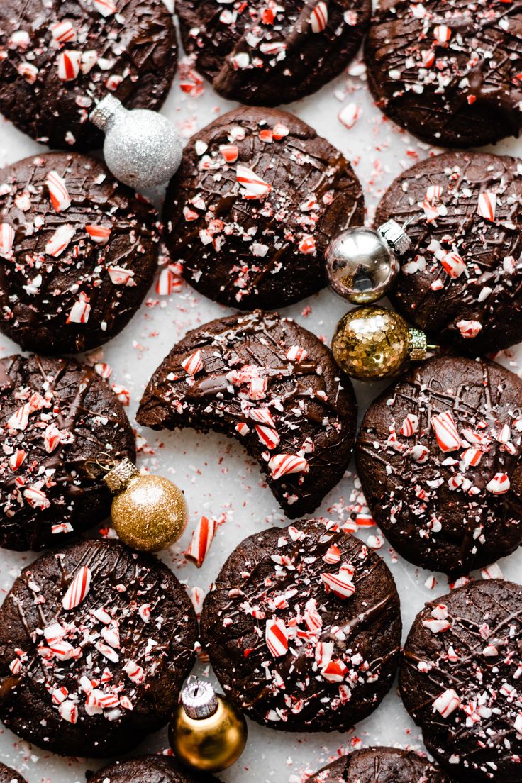 chocolate cookies with candy canes and christmas decorations