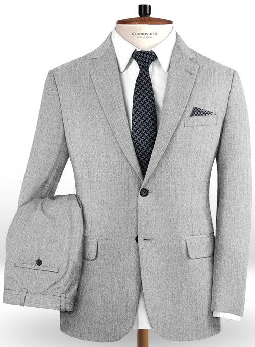 For the man that wants both fashion and practicality, our timeless Reda Worsted Mid Gray Pure Wool suit is best one to do so. Crafted from pure wool, the Reda suit radiates sophistication with a strong silhouette which is designed to flatter your natural physique without being restrictive. Unite it with a matching waistcoat, a crisp white shirt, patterned blue tie and black derby shoes. 
 
 Look Includes  Reda Worsted Mid Gray Pure Wool Fabric  Two Button Jacket Style  Notch Lapel  Real Horn Sol White Linen Suit, Green Velvet Jacket, Peaky Blinders Suit, Grey Wool Suit, Black Brogues, Royal Blue Suit, Black Oxford Shoes, Herringbone Tweed, Black Oxfords