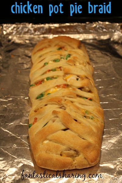 chicken pot pie braid on top of aluminum foil with text overlay that says chicken pot pie braid