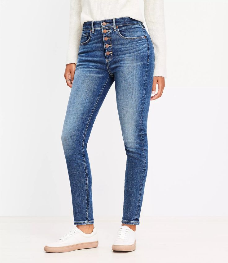 Button Front High Rise Skinny Jeans in Classic Mid Wash Mid-rise Slim Fit Bottoms With Button Closure, Slim Fit Mid-rise Bottoms With Button Closure, Casual Fitted Jeggings With Button Closure, Fitted Mid-rise Jeggings With Button Closure, High Waist Fitted Jeggings With Button Closure, High Rise Stretch Jeggings With Button Closure, Stretch High Rise Jeggings With Button Closure, High Waist Jeggings With Button Closure, High Waist Slim Fit Bottoms With Button Closure