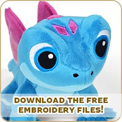 a blue stuffed animal with the words, free embroidery files