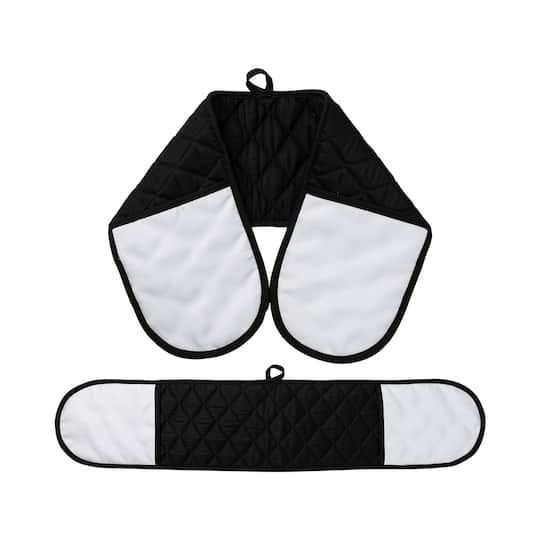 two black and white oven mitts on top of each other, one with an oven mitt attached to it