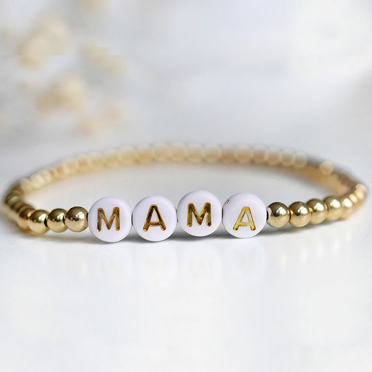 4mm gold filled beads, 7mm letter beads stretchy bracelet, one size fits most. Trendy Gold Stretch Bracelet, Hypoallergenic, Casual Gold Bracelets With 8mm Beads, Gold Name Bracelet With Letter Beads, Casual Stretch Bracelet With Round Beads For Mother's Day, Gold Beaded Stretch Bracelet Casual, Casual Round Beads Stretch Bracelet For Mother's Day, Minimalist Gold Bracelet With Letter Beads, Adjustable Hypoallergenic Gold Stretch Bracelet, Gold Beaded Casual Stretch Bracelet