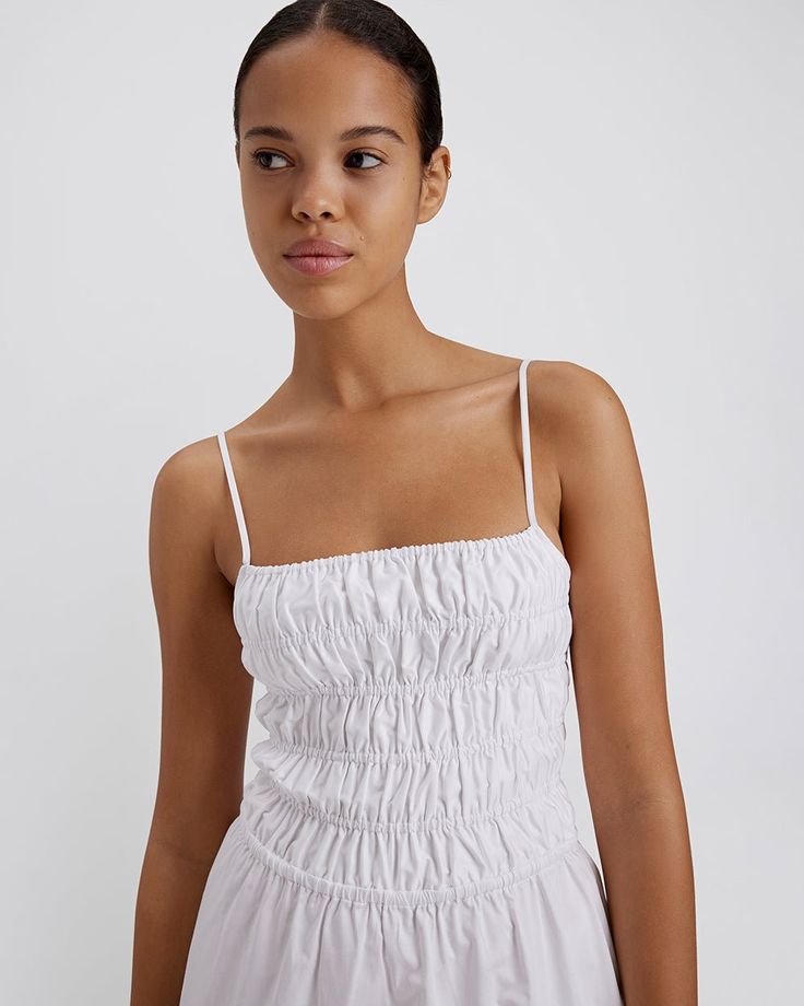 Our bestselling Delta Midi Dress is back. The smocked bodice with a relaxed skirt offers a flattering fit for all figures. This silhouette offers adjustable straps, pockets, and an exposed back with elastic straps for optimal fit. Fred Segal, Solid & Striped, Bodice, Adjustable Straps, Online Shopping, Midi Dress, Elastic, Skirt, White