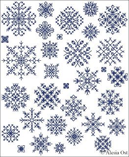 cross stitch snowflakes in blue and white