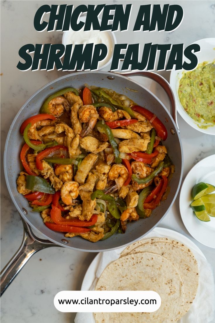 a pan filled with chicken, peppers and tortillas next to guacamole