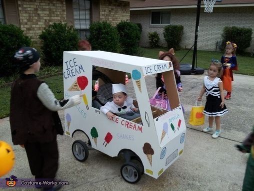 children dressed up as ice cream cars on the street