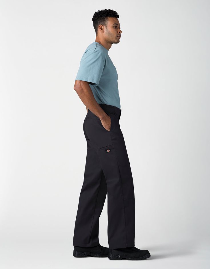 Any job is easier with Dickies’ Loose Fit Double Knee Work Pants, that work with you at a great value. Your knees don’t need back-up for blow outs because there’s a fabric reinforcement that keeps you covered. These work pants have a roomy fit in the seat and thigh that makes bending and kneeling more comfortable, while the polyester/cotton blend spells durability at a value. Multi-use pockets on the leg and back are a nice supplement to the heavy-duty belt loops that hold even the heaviest tool Classic Black Cargo Pants For Work, Work Pants With Cargo Pockets, Full-length Cargo Work Pants, Full Length Work Pants With Cargo Pockets, Relaxed Fit Work Pants With Welt Pockets, Classic Black Straight Leg Work Pants, Black Bottoms With Pockets And Standard Cut Leg, Black Tapered Leg Work Pants With Pockets, Black Straight Leg Work Pants With Pockets