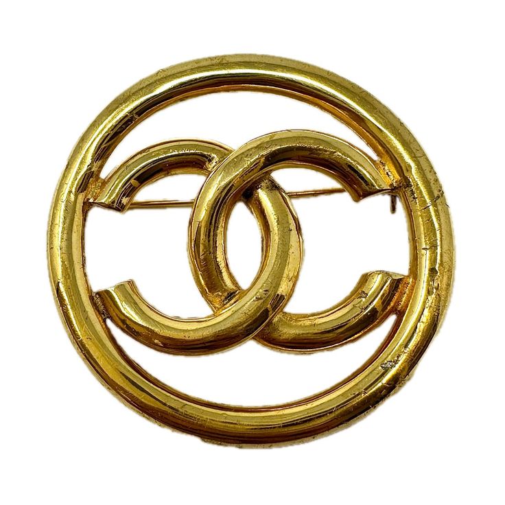 Chanel 1993 24K Gold-Plated Interlocking CC Logo in Circle Pin/Brooch Designer = Chanel Color = Gold Material = Gold Plated Condition = Good Class = Premier Location: Glencoe Item Number: 11041-279 Item ID: 276351 Category: Pin Logo In Circle, Chanel 1993, Chanel Pin, Chanel Pins, Premier Jewelry, Suit Shoes, Fashion Design Clothes, Instagram Icons, Cc Logo