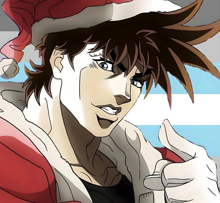 a man wearing a santa hat giving the thumbs up