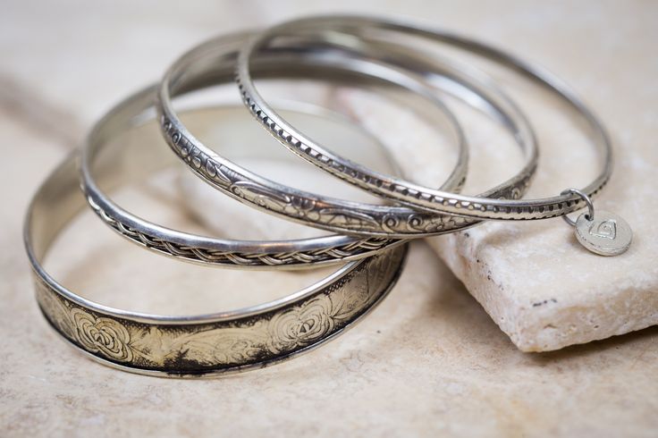 Add a resplendent touch to a down-to-earth look as you adorn yourself with this mixed bangle-bracelet set.  This product was handcrafted and ethically sourced from artisans in India. A portion of our products are made by women freed from human trafficking. 100% of the profits benefit missions that serve these women in India. Bohemian Stackable Wedding Bracelets, Bohemian Nickel-free Bangle, Bohemian Stackable Bracelet Jewelry, Handmade Artisan Bangle, Bohemian Stackable Bracelet, Vintage Stackable Bracelet Jewelry, Bohemian Stackable Bangle Cuff Bracelet, Bohemian Bangle As A Gift With Unique Variations, Bohemian Stackable Bangle Jewelry