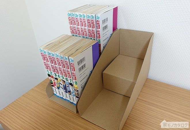 three boxes stacked on top of each other in a cardboard box sitting on a table