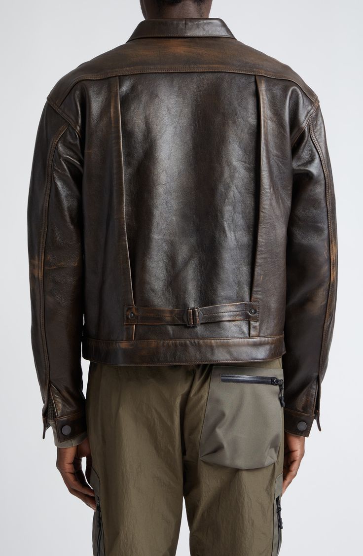 Made from lambskin leather with a hand-distressed finish, this jacket features a slightly cropped, boxy fit and rivet-detailed pleats framing the placket 22 1/2" length (size Medium) Front button closure Spread collar Button cuffs Chest patch pockets; front welt pockets Lined Leather Professional leather clean Made in the USA Designer Clothing Leather Coat Men, Rugged Brown Biker Jacket For Work, Leather Jacket Design, 80s Leather Jacket Outfit Men, Men Leather Jacket, Mens Leather Jacket, Rugged Leather Biker Jacket For Workwear, Khaki Leather Jacket, Men's Luxury Leather Jacket With Pockets