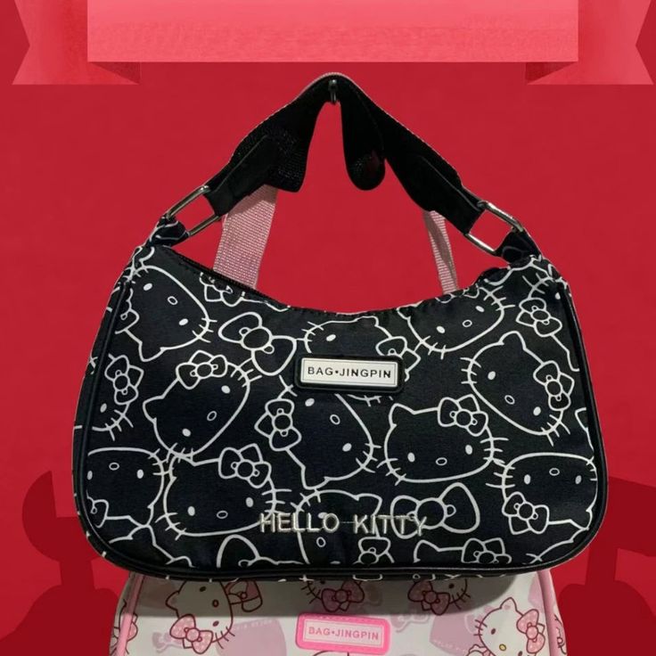 y2k-kawaii-fashion-Sanrio Handbag-Black Hello Kitty-24X17X7cm-Pinky Dollz Trendy Hello Kitty Print Bag For Everyday Use, Trendy Hello Kitty Everyday Bag, Trendy Hello Kitty Print Rectangular Shoulder Bag, Trendy Rectangular Bag With Hello Kitty Print, Trendy Rectangular Hello Kitty Shoulder Bag, Hello Kitty Print Travel Shoulder Bag, Rectangular Hello Kitty Print Shoulder Bag For Shopping, Retro Black Baguette Bag For Daily Use, Black Hello Kitty Print Bag For Daily Use