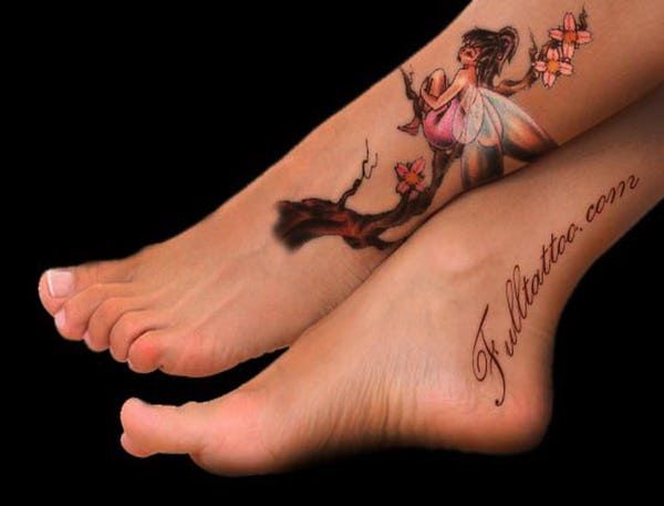 two people with tattoos on their feet