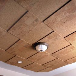 the ceiling is covered in wood planks and has a light fixture on top of it