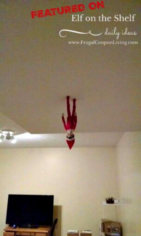 the ceiling is decorated with an elf's head and feet hanging from the ceiling