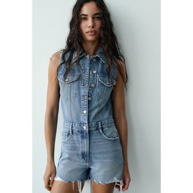 Sleeveless Denim Jumpsuit With Lapel Collar. Front Pockets. Patch Pockets At Chest And Back. Frayed Hem. Front Metal Button And Zip Closure. Blue | 8197/187 Outer Shell 60% Cotton 40% Lyocell M205 Casual Blue Sleeveless Shortalls, Chic Denim Shortalls For Summer, Chic Denim Overall Shortalls, Casual Medium Wash Sleeveless Shortalls, Casual Sleeveless Medium Wash Shortalls, Chic Sleeveless Medium Wash Denim Jumpsuit, Chic Medium Wash Sleeveless Overalls, Chic Sleeveless Light Wash Denim Jumpsuit, Blue Sleeveless Shortalls For Summer