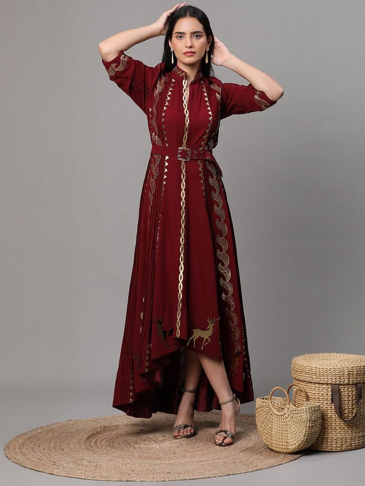 Maroon Georgette Anarkali suit and pants set with golden cutwork. The intricate details and luxurious materials make this ensemble a truly special piece to add to your wardrobe. Every detail has been thoughtfully crafted to elevate your style to the next level. Anarkali Style Fitted Party Kaftan, Fitted Bollywood Kaftan For Navratri, Bollywood Style Fitted Kaftan For Navratri, Fitted Festive Kaftan With Zari Work, Festive Fitted Kaftan With Zari Work, Traditional Maxi Length Salwar Kameez For Formal Occasions, Traditional Formal Salwar Kameez Maxi Length, Formal Salwar Kameez With Resham Embroidery In Maxi Length, Formal Maxi Length Salwar Kameez With Resham Embroidery