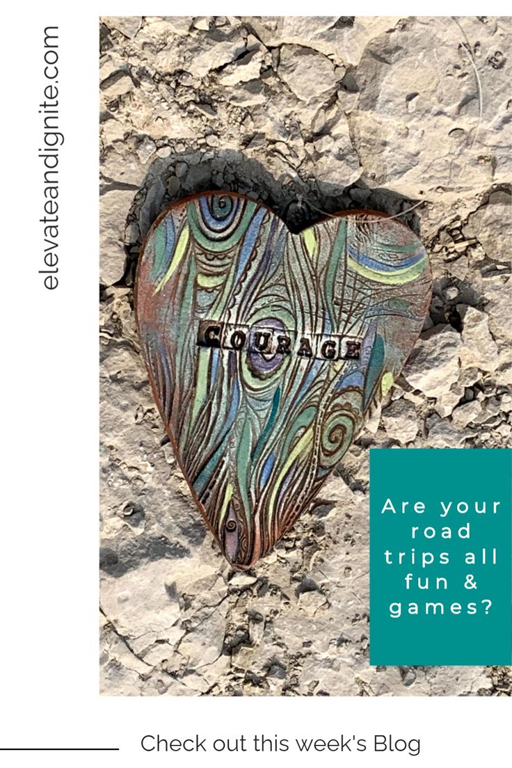 a heart shaped object sitting on top of a rocky surface with the words, are your road trips all fun and games?