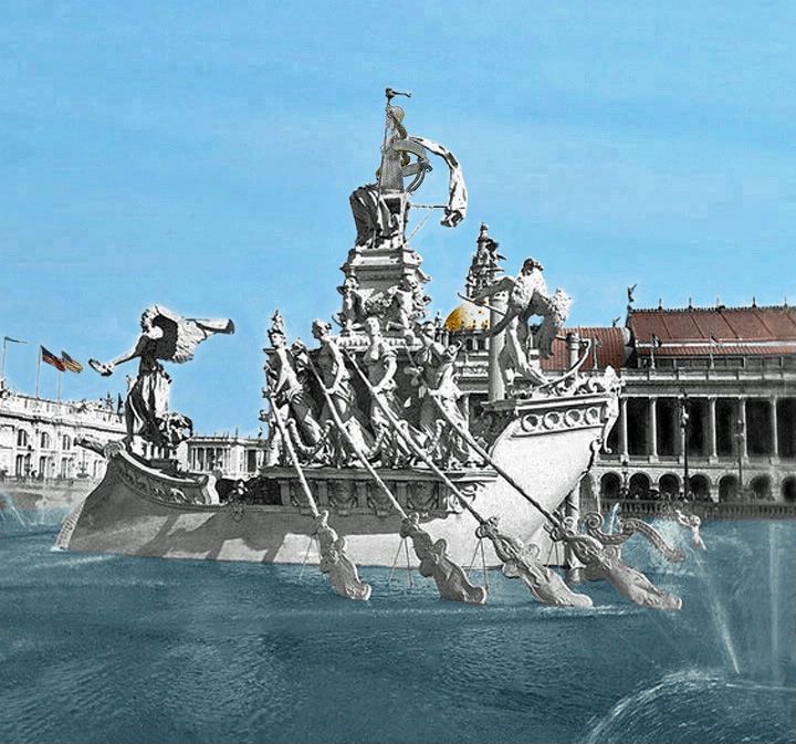 a large boat floating on top of the ocean next to a tall building with statues on it