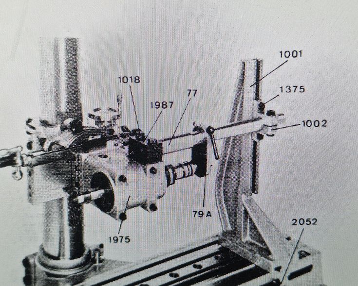 an image of a machine with parts labeled