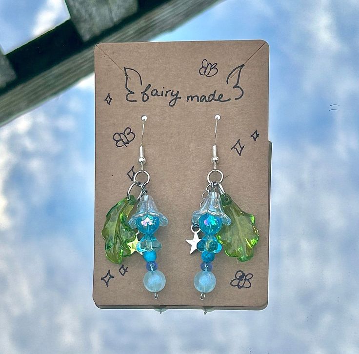 Blue Whimsical Dangle Flower Earrings, Whimsical Blue Dangle Flower Earrings, Whimsical Blue Flower Earrings, Green Fairy Earrings For Gift, Fairy Style Green Earrings For Gifts, Fairy Style Handmade Dangle Earrings, Fairy Earrings, Pet Friendly, Jewelry Earrings Dangle