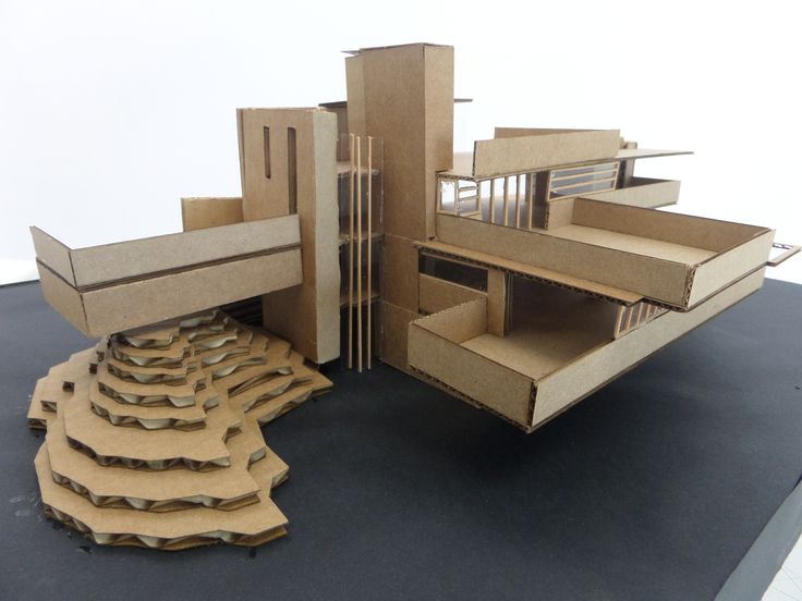 an open cardboard box with several sections cut out and stacked on top of each other