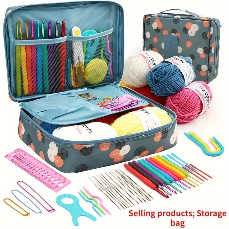 an open suitcase filled with knitting supplies and crochet hooks