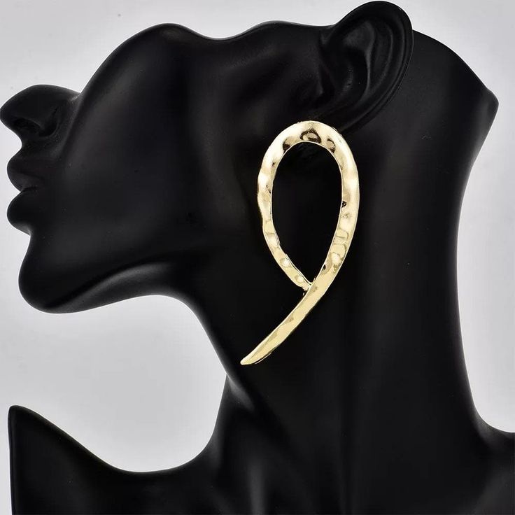 Elevate your style with our Nkono Statement Stud earrings. These lightweight earrings feature a stunning gold-plated design, adding a touch of sophistication to any outfit. At 2.95 inches, they make a bold statement without weighing you down. Perfect for everyday wear or special occasions. Party Gold-tone Drop Hoop Earrings, Chic Gold Wrap Earrings, Trendy Gold Teardrop Metal Earrings, Gold Metal Wrap Earrings For Party, Chic Gold Teardrop Earrings For Party, Gold Chic Wrap Earrings For Party, Gold Chic Wrap Earrings, Gold Drop Earrings For Party, Gold Drop Wrap Earrings For Party