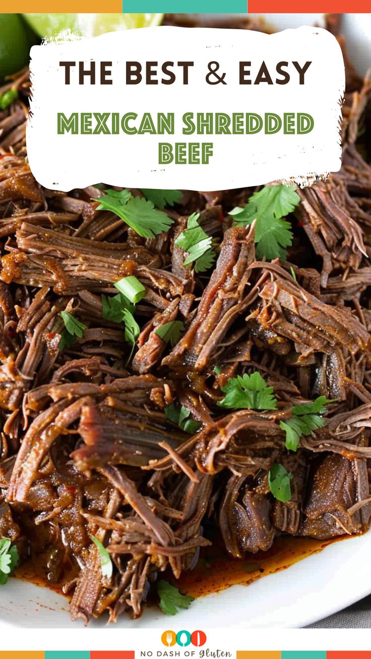 the best and easy mexican shredded beef recipe on a white plate with cilantro