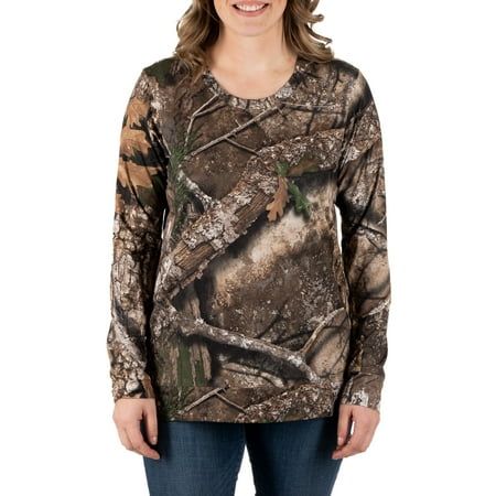 For the athletic outdoorswomen, the avid sport hunters, and the casual nature enthusiasts alike - the Women's Long Sleeve Camouflage Hunting Performance Tee Shirt by Realtree is the camouflaged activewear you've been looking for. Made from a super soft and flexible blend of recycled polyester and spandex, this performance tee offers unparalleled comfort and mobility. Its four-way stretch, moisture-wicking fabric allows for plenty of movement while keeping you cool and dry while out on the trail, and its built-in scent reduction technology keeps you stealthy and undetected. Whether you're hunting, hiking, or just enjoying the great outdoors, this camo top is a must-have for any adventure. So why settle for ordinary when you can have the best? Grab yours today and experience the ultimate in Hunting Outfits For Women, Hunting Outfits, Fishing Tee Shirts, Camo Top, Camo Tee, Womens Camo, White Long Sleeve Shirt, Hunting Clothes, Performance Wear