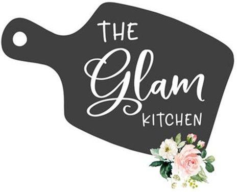 the glam kitchen logo with flowers on it