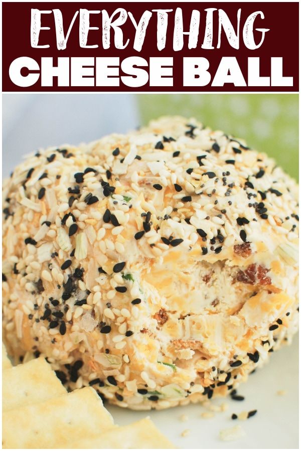 everything cheese ball on a plate with crackers